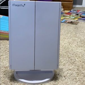 A 4 tier makeup mirror